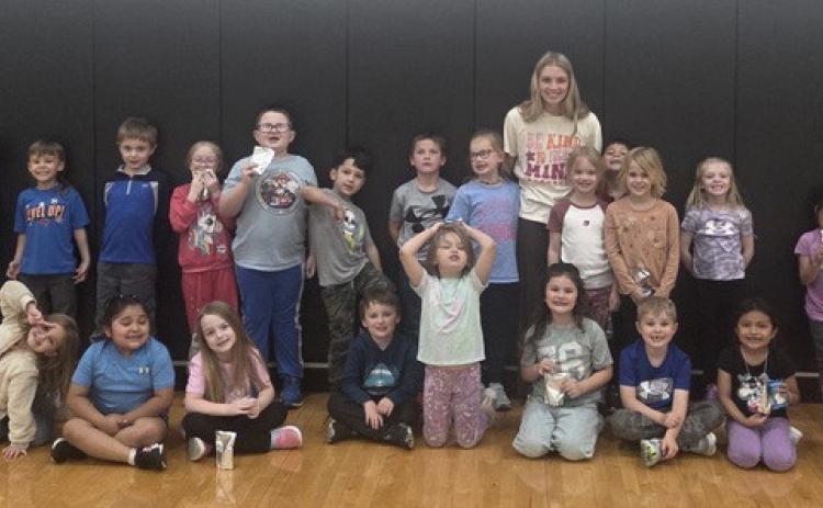 .Shelby -RC senior Danica Watts is pictured here with the Kindergarten class at Shelby-RC Elementary. Watts is the Kindergarten helper in PE. Photo provided.