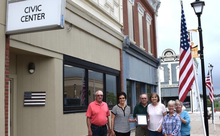 An organization and couple were recently recognized for faithfully flying the flag in Osceola. Above: The Osceola Senior Center, PCN photo by Beth Sparrow. Below: Jim and Diana Langer, PCN photo by Cienna Friesen.