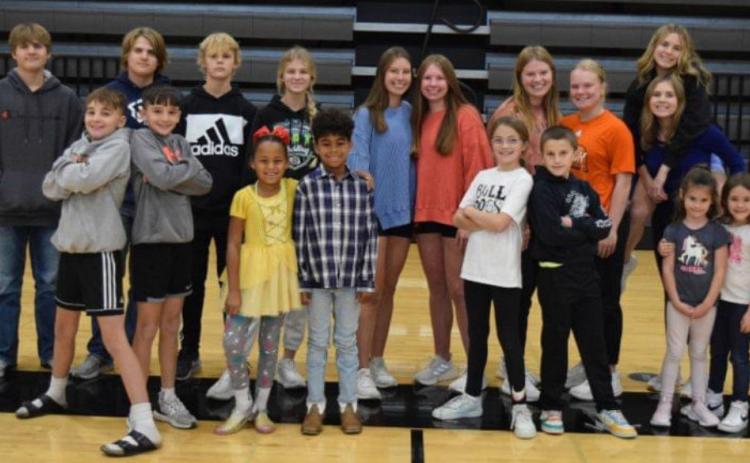 Above: The Osceola Public School system has 9 (NINE!) sets of twins. Pictured are High School Twins (back row): Dylan and Ashton Merry, Max and Maggie Fritton, Charisa and Savanna Boden, Melinn and Janna Roberts, and Blaire and Myah Sanley. Elementary Twins (front row): Houston and Nixon Hinkle, Gianna and Jericho Battle, Sarah and Brantley Carnes, and Eliza and Evelynn Leeling. Can you tell which are identical and which fraternal? Photo provided by Osceola School.