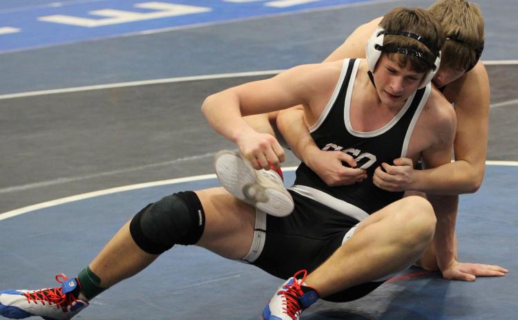 Paxton Burke struggles against his opponent at the Lakeview Invite. PCN photo by Travis Lane.