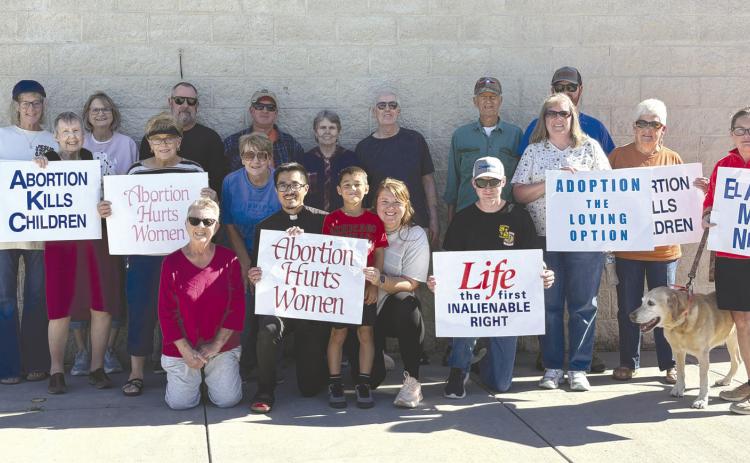 About 20 people participated in life chain on Sunday, October 4th in Osceola. They represented several churches in the area. Photo provided.