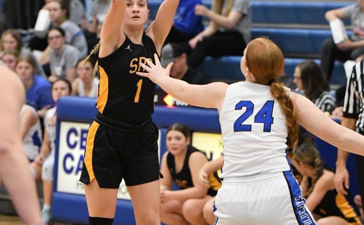 Taya Pinneo takes one to the hoop. PCN photo by Rick Holtz.