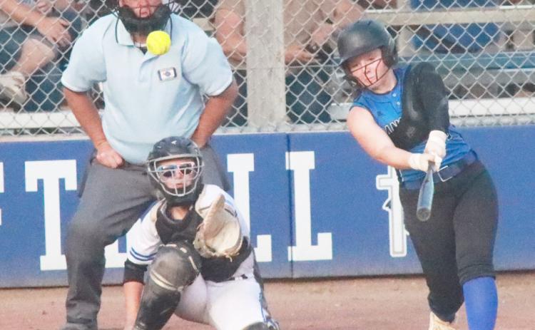 Blue River’s Ashlyn Long ropes a single to right field in the Panthers season opener at Guardian Angels Central Catholic. Long leads the team with a .472 batting average. PCN file photo by Ken Kush.