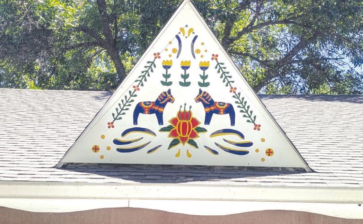 Above: Elisa Kurth painted new artwork and signs located at Buckley Park in Stromsburg. They are on the covered picnic shelter/pavilion in the old camping area. Photos provided.