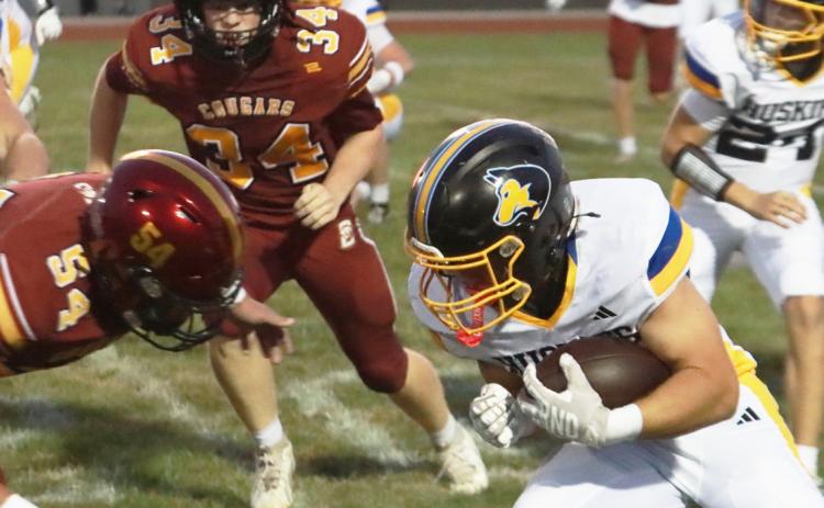 SRC senior Carter Eickmeier looks for contact in the Huskies win at Conestoga earlier this year. Eickmeier is 200 yards shy of 4,000 for his career. PCN file photop by Ken Kush.