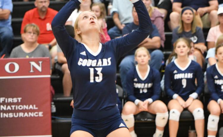 Edie Peterson sets the offense against Sutton last Thursday. PCN photo by Rick Holtz.