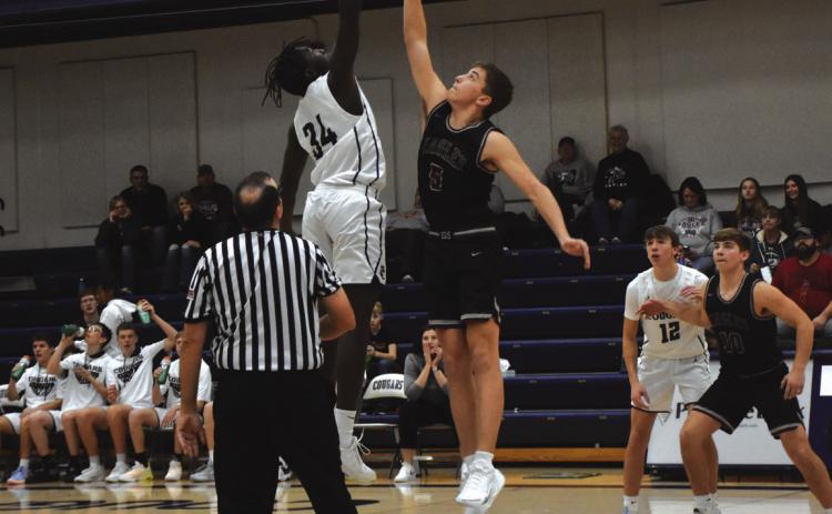 James Elgin gets the tip-off against BDS on Friday. PCN photo by Beth Sparrow.