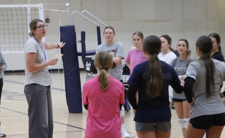 Cross County head coach Emmie Finkral addresses the team just before the start of practice on Tuesday. The Cougars will face the No. 1 seed Amherst Broncos at 1 p.m. on Thursday at PBA. PCN photo by Ken Kush.