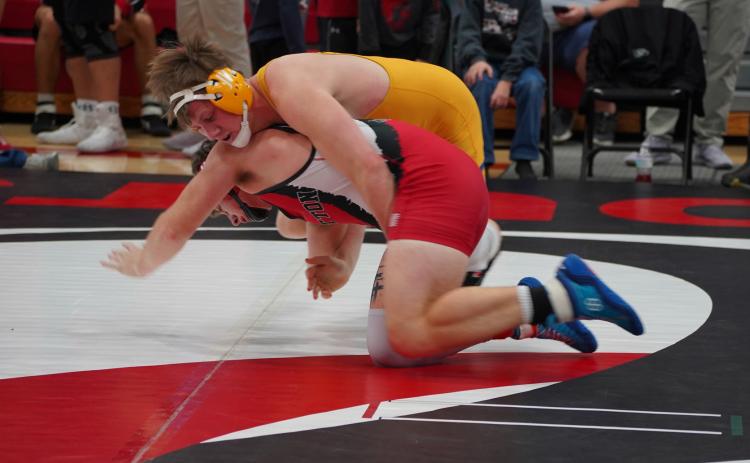Coy Vrbka wrestles Canon Peterson (Sutton) on Saturday. He place first in his weight class. PCN photo by Jen Vrbka.