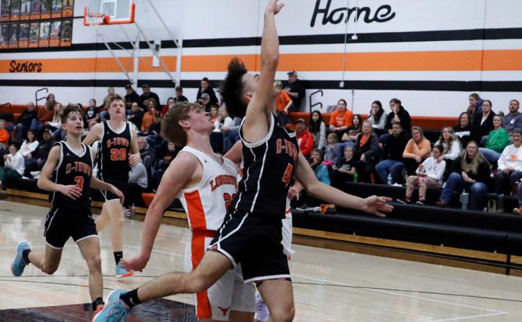 Above: Brayden Santos shoots the ball. PCN photos by Blaine Winslow.
