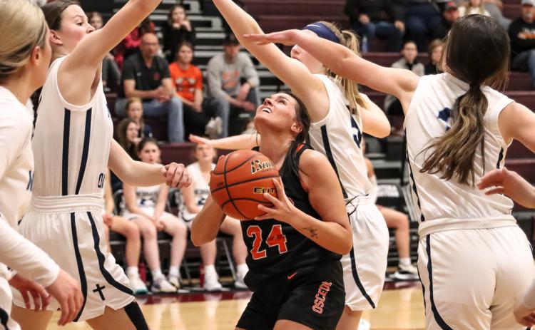Courtney Sunday looks for room to shoot. PCN photo by Blaine Winslow.