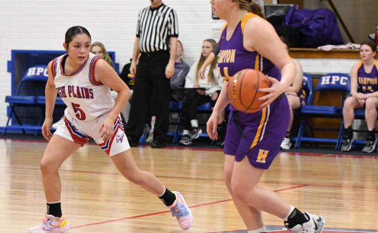 Gahvi Lesiak plays defense against Hampton. PCN photo by Rick Holtz.
