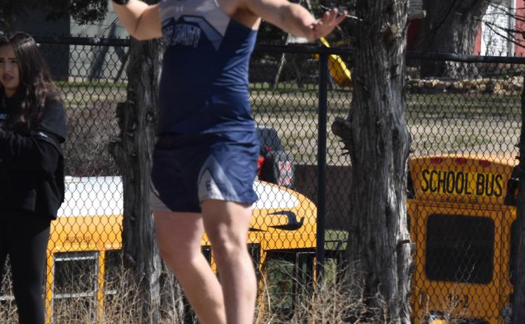 Above: Alex Noyd throws the shot for a second place finish. PCN photo by Cienna Friesen.