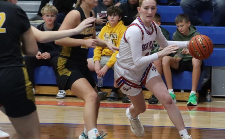 High Plains senior Peyton Hofmann (4) is shown here on the drive down the baseline against McCool Junction earlier this year. Hofmann led the Storm with 14 points in the 65-33 loss to Shelton last Tuesday. PCN file photo by Ken Kush