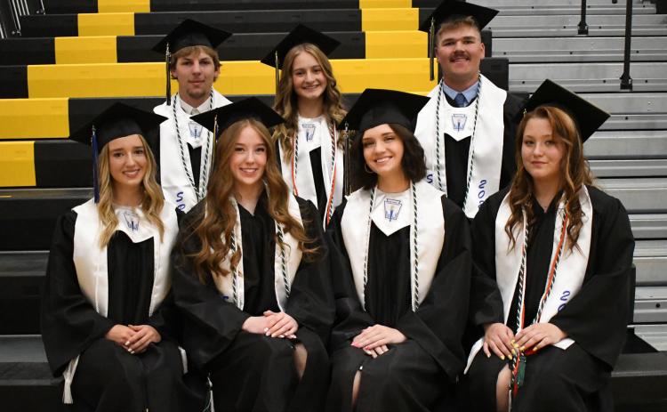 Shelby-Rising City honored grads included magna cum laude students (front) Katelyn Nekl, Mackenzie Kuns, Clare Willis, Emma Svoboda; (back) Dalton Pokorney, Taya Pinneo and Collin Vrbka (wearing white cords). Photo by SRC Yearbook.