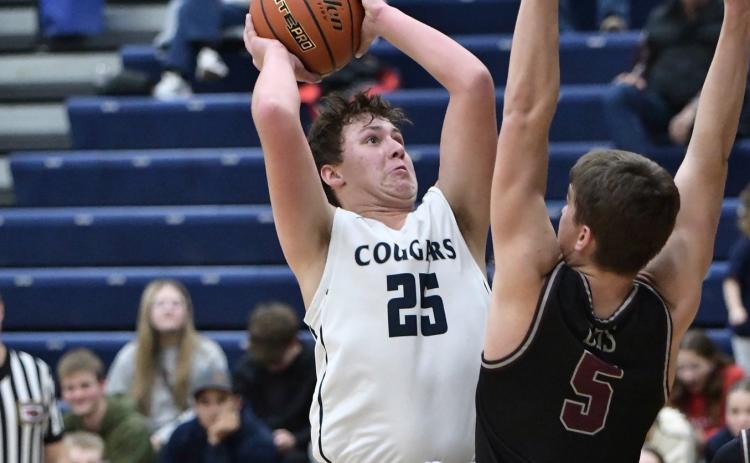 Cross County’s Gabe Nuttelman (25) looks for his shot against the BDS defense this past Friday night. PCN photo by Rick Holtz.