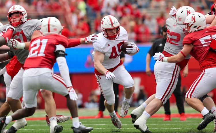 Izaac Dickey of Stromsburg plays fullback for Nebraska and rushed for 4 yards in the fourth quarter. Photo by Kenny Larabee, KLIN, used with permission.