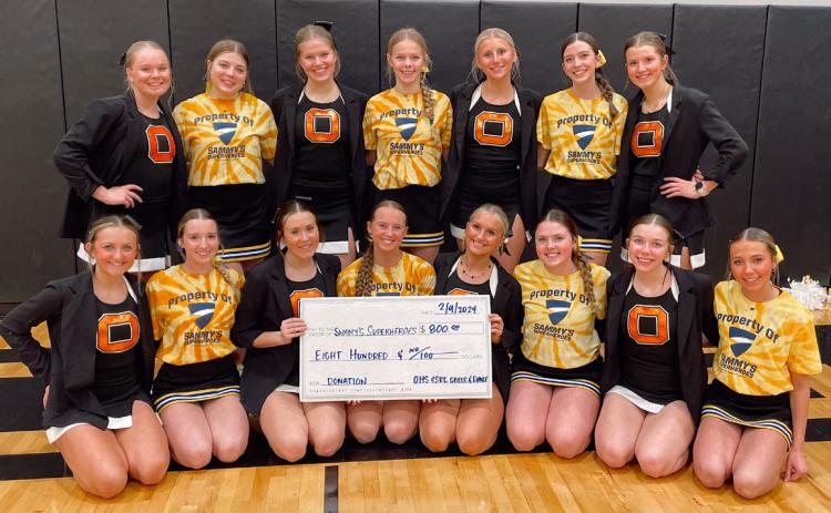 Pictured together are the 2023-2024 Osceola Cheer and Dance Team and SRC Cheer and Dance Team with a donation check of $800 to Sammy’s Superheroes. Photo provided by Tasha Weller.