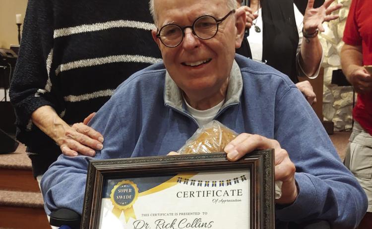 Super Swede Dr. Rick Collins was presented his award on Friday evening at the Evangelical Free Church. Photo by Swedish Festival Committee.