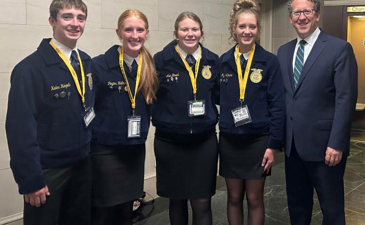 High Plains FFA members Haden Helgoth, Peyton Hofmann, Allie Howell and Rylee Hofmann join Congressman Adrian Smith in Washington DC. Photo provided by Tom Hofmann.