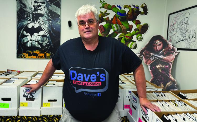 Dave Shram sells comic books and collectible cards from his shed in Osceola. He also attends Comic-Con in Omaha. Photo by Rick Holtz.