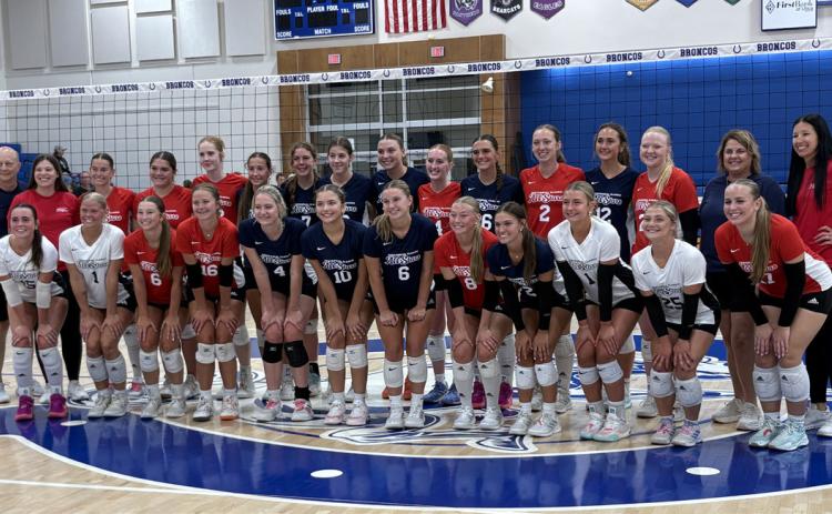 The Red All-Stars and Blue All Star Volleyball teams get together for a group photo after the Red defeated the Blue in the Annual Centennial Volleyball Classic 3-2. PCN photo by Beth Sparrow.