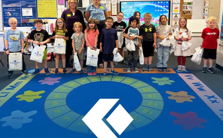 Above: As part of the national Teach Children to Save program, Cornerstone Bank employees visited preschool, kindergarten, and 1st grade students in April to teach the importance of saving money and building smart financial habits at an early age. Teach Children to Save is a nationwide financial education initiative that helps students learn healthy saving habits and basic money management skills through fun, age appropriate classroom activities and lessons. Photo provided.