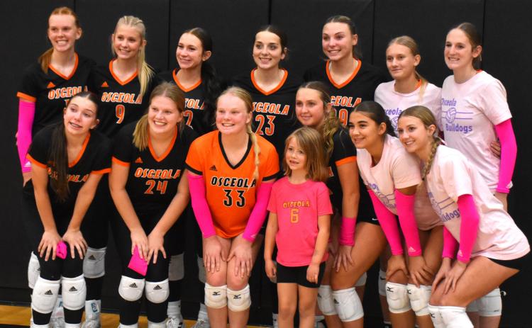 Osceola celebrated “pink out” night for breast cancer awareness. Ana was the “Bulldog of the Game” and got to sit on the bench with the team. PCN photo by Beth Sparrow.