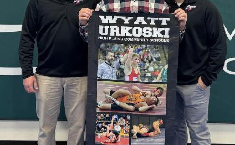 Wyatt Urkoski (senior at High Plains) got his 100th pin at the Norm Manstedt Invitational hosted by High Plains at Central Community College in Columbus. Pictured with him is his coach, Martin Phillips on the right, Corbey Grause (far left) and Jason Church. Photo provided.