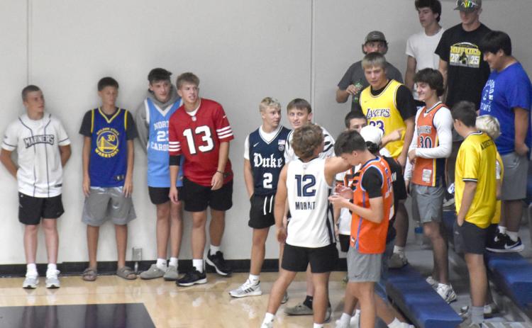 The Shelby-Rising City boys showed up to support the volleyball team at Cross County last Thursday. PCN photo by Beth Sparrow.