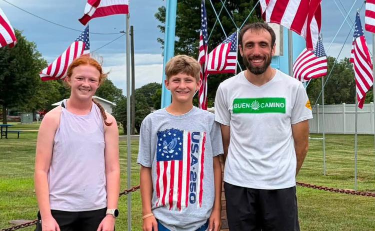 Men’s 5k winner Fr. Schleis 16:30 (right) Women’s 5k winner Ann Prigge 22:46 (not pictured) Boys bike Adam Fozzard 14:01 (middle) Girls bike Sloen Hines 20:13 (left)