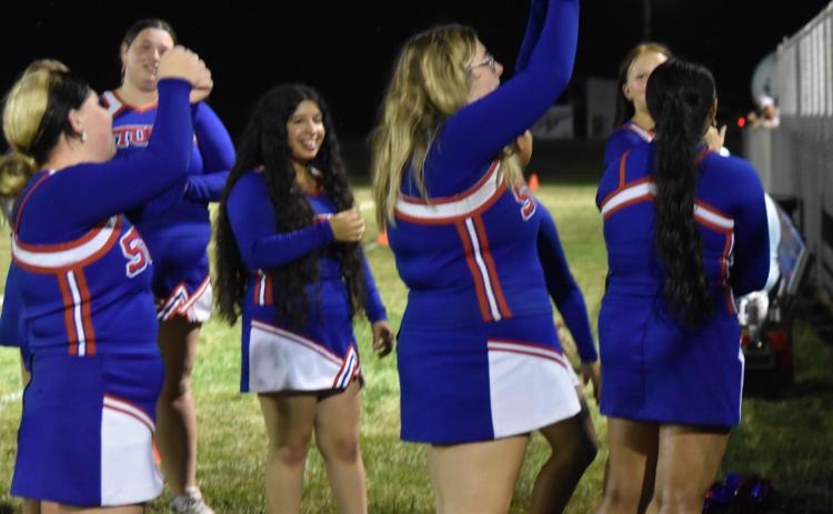 The High Plains Storm Cheerleaders fire up the crowd during halftime of Friday night’s game in Clarks between the Nebraska Lutheran Knights and the High Plains Storm. The Storm rolled to their second win in as many games. PCN photo by Beth Sparrow.