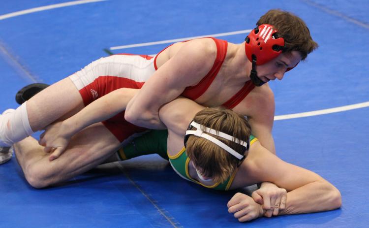 Lance Russell wrestles an opponent at the HPC invite earlier this season. PCN file photo by Travis Lane.