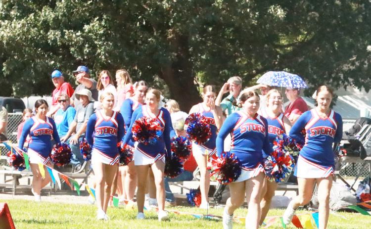 The High Plains Cheerleaders were out in force on a hot muggy day in Elba to cheer on the Storm football game in their six-man debut a 58-0 win. PCN photo by Ken Kush.