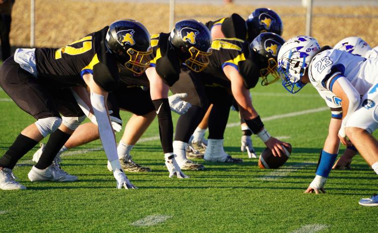 The linemen are ready to block for the playoff game against Arapahoe. PCN photo by Jen Vrbka.