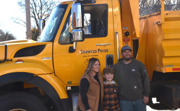 Collin Brockevelt (above with his parents), a 3rd grader at High Plains Elementary won the Name A Snowplow contest sponsored by the Nebraska Department of Transportation. He was recognized at school on Tuesday for the name “Snowcus Pocus”. PCN photos by Beth Sparrow.