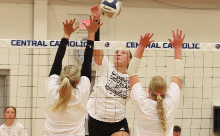 Osceola’s Graci Conkling hammers the kill through the potential block set up by the Goldenrod Conference in Saturday’s game at GICC. Conkling was unofficially credited with 11 kills. PCN photo by Ken Kush.