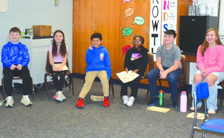These students read poems and other written works on Thursday. Pictured above are Collin Brockevelt, Nickenzlee Confer, Alessandro Encamacion-Marino, Di’Mya Kershaw, Wesley Lewis and Sutton VanPelt.