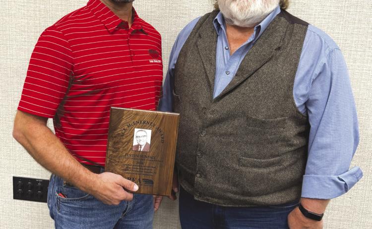 Justin Sunday of Polk County RPPD (Rural Public Power District) was awarded the Jack McEnerney award. He is pictured with retired safety director, Tim Teegerstrom. Photo provided.