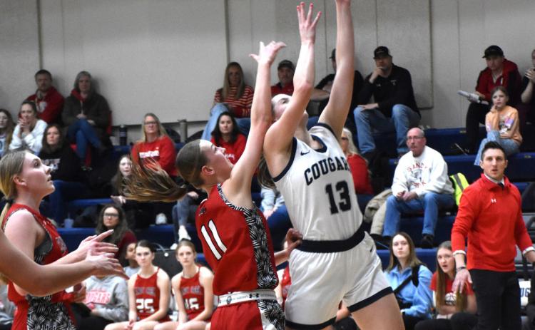 Adrienne Waller goes up for a basket against Sandy Creek. PCN photo by Beth Sparrow.