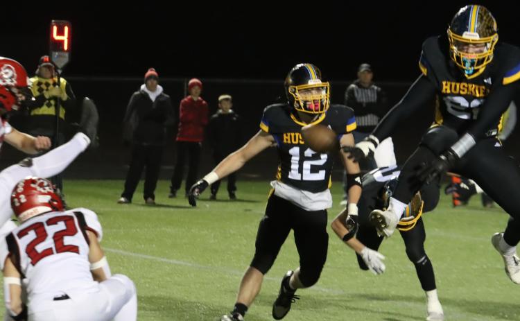 The Shelby-RC Huskies defense made their presence known early in the game on Friday night as senior Coy Vrbka (22) blocks an attempted field goal by the Pender Pendragons in the first quarter. The Huskies moved the ball down the field and scored early in the second quarter and never looked back in their 28-6 win. PCN photo by Ken Kush.