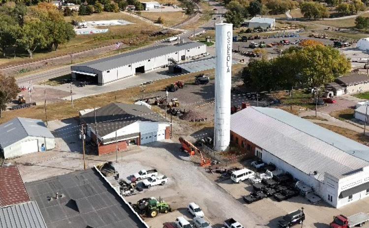Above: The Osceola water tower has stood since 1905 but is slated to come down. Photo by Charles Noyd (by drone).