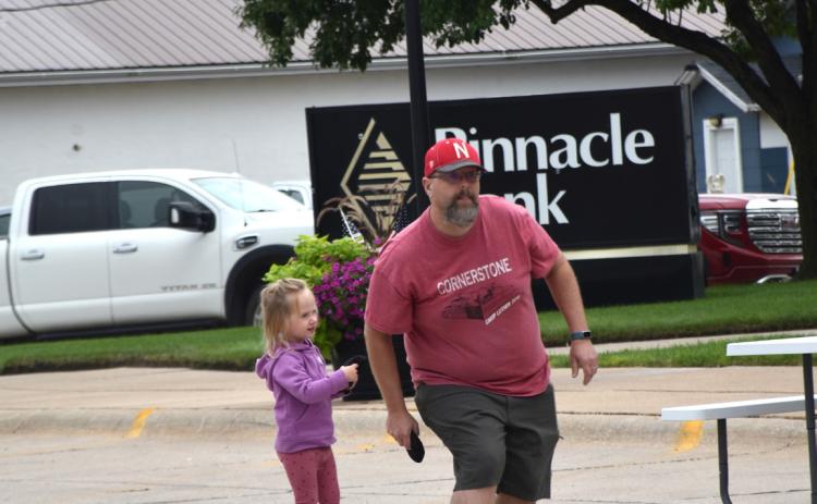 Cornhole is a fun activity for all ages at the Shelby Farmers Market held every Wednesday starting at 6 PM in downtown Shelby. PCN file photo by Beth Sparrow.
