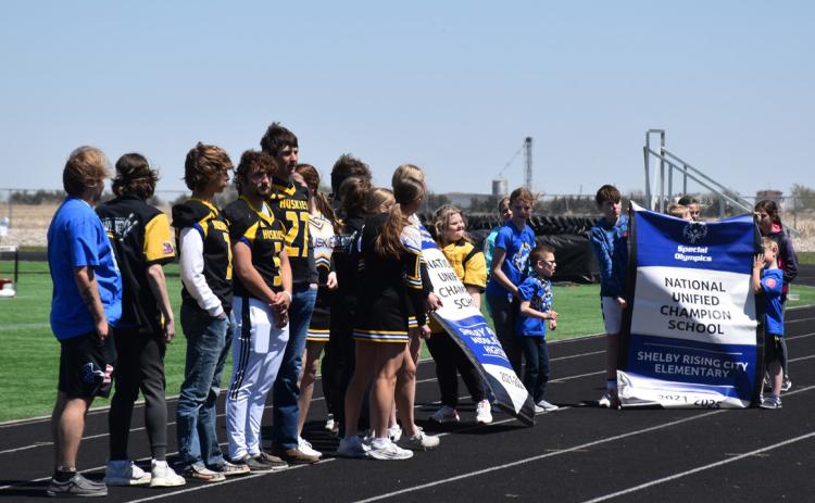 Pictured above are Shelby-Rising City students with their National Unified Champion School banner. PCN photos by Beth Sparrow