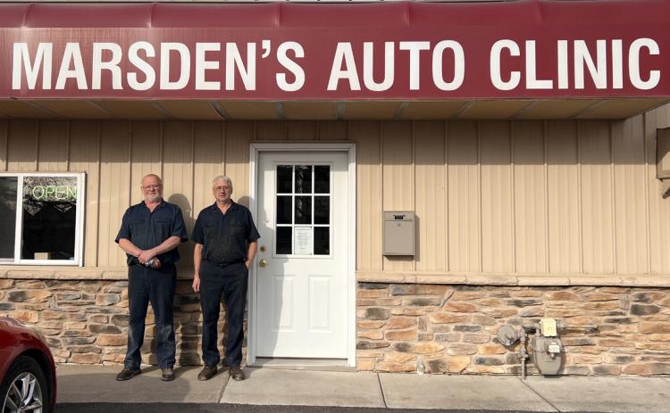 Brothers Roger and Ronal Marsden stand outside Marsden’s Auto Clinic. PCN photo by Cienna Friesen.