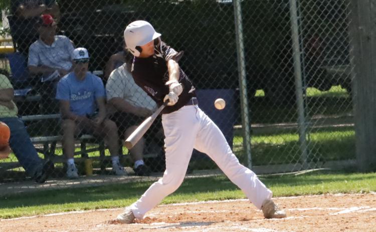 SOS Junior Rebel Jaxon Carter makes solid contact but flies out to left field in the bottom of the second inning on Friday. PCN photo by Ken Kush.