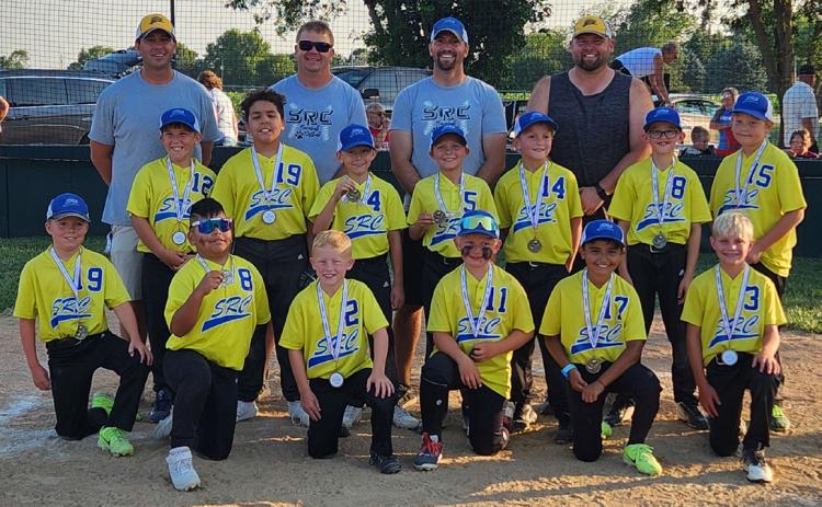 The Shelby 8 and under baseball team defeated Duncan 11-10 in the championship game and won the tournament, ending their year with a 14-3 record. Photo provided.