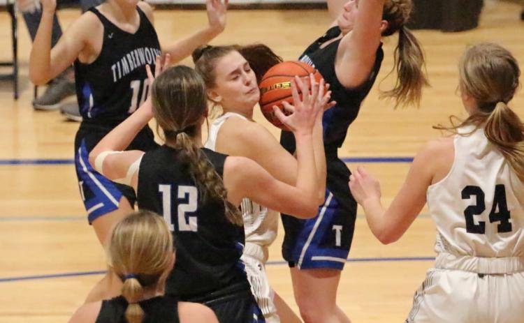 Shyanne Anderson (center) is one of the top scorers returning for this year’s Cougars. PCN file photo by Travis Lane